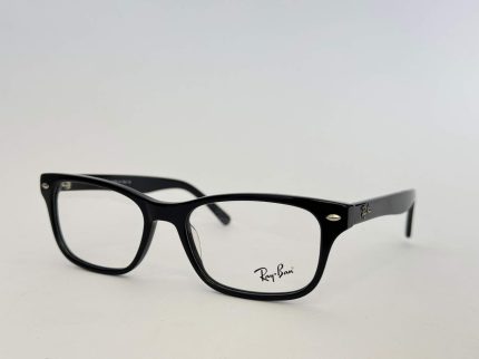 Black Skelete Optike glasses with stylish rectangular frame.