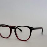 Skelete Optike Daisy Store glasses, stylish black and red frame.