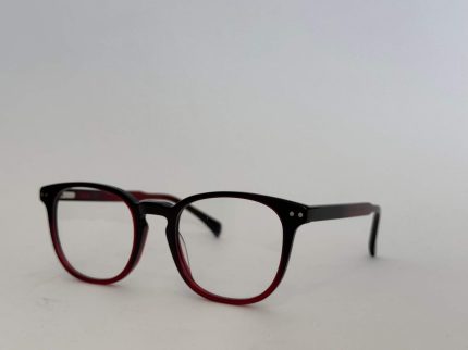 Skelete Optike Daisy Store glasses, stylish black and red frame.