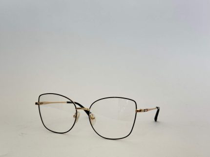 Skelete Optike Daisy Store stylish eyeglasses with gold accents.