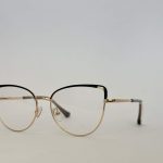 Skelete Optike Daisy Store stylish gold-rimmed eyeglasses.