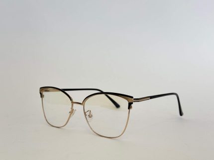 Stylish Skelete Optike Daisy Store eyeglasses with gold frame.