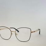 Skelete Optike Daisy Store stylish gold-rimmed eyeglasses.
