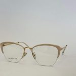 Skelete Optike Daisy Store stylish eyeglasses with gold frame.