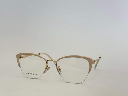Skelete Optike Daisy Store stylish eyeglasses with gold frame.