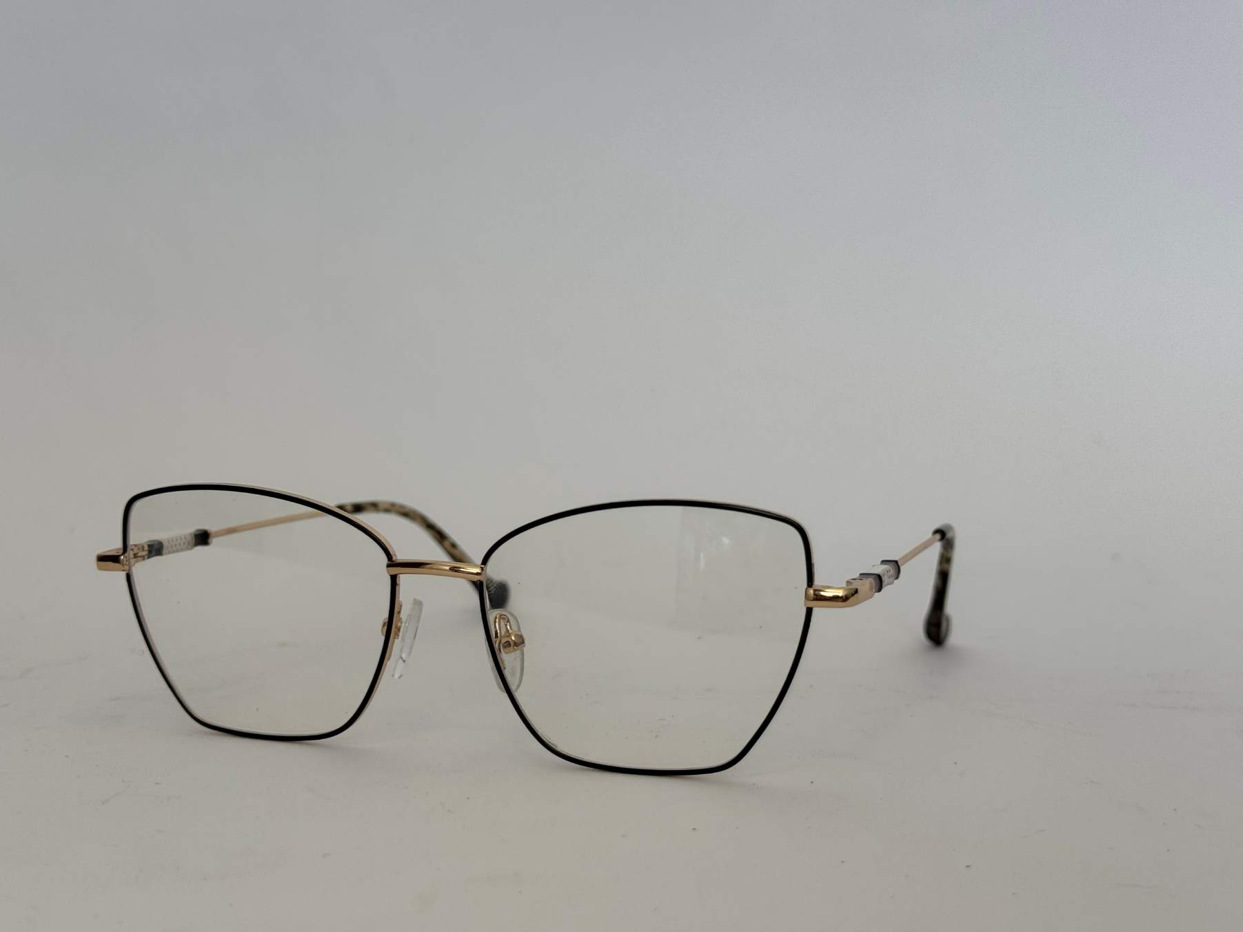 ds-syze-optike-151-kryesore Skelete Optike Daisy eyeglasses with stylish metal frame.