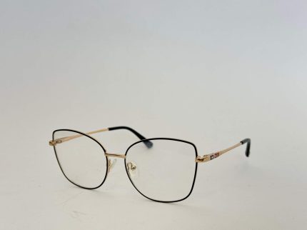 Skelete Optike Daisy Store stylish eyeglasses with gold and black frame.