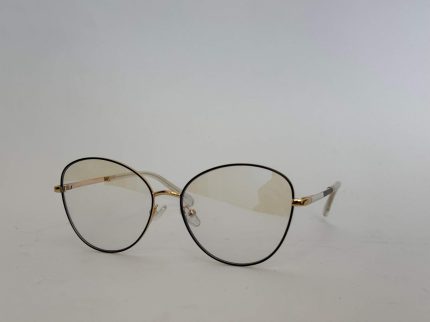 Skelete Optike Daisy Store stylish gold-rimmed eyeglasses.