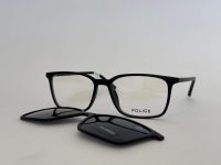 Skelete Optike glasses with clip-on polarized lenses.