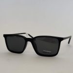Skelete Optike sunglasses with clip-on, black polarized lenses.