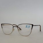Women's stylish cat-eye glasses with thin metal frame.