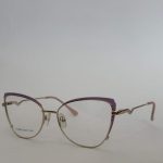 Stylish women's glasses with purple accents and gold frame.