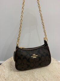 Coach Teri Shoulder Bag with chain, monogram pattern, elegant design.