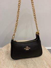 Black Coach Teri Shoulder Bag with gold chain strap.