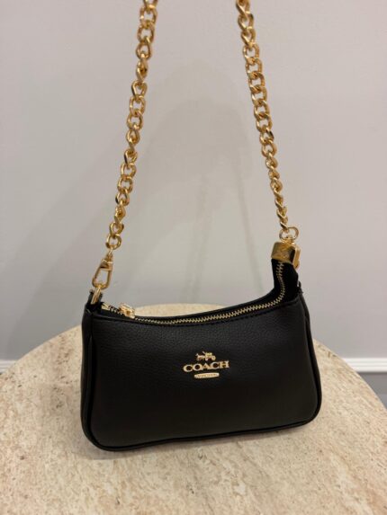 Black Coach Teri Shoulder Bag with gold chain strap.