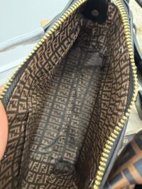 Fendi By The Way bag interior with logo pattern and zipper.
