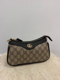 Gucci Aphrodite GG handbag with gold chain, women's fashion accessory.