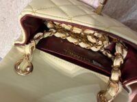 Chanel Mini Flap bag with gold chain detail and quilted leather.