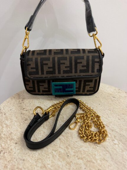 Fendi Baguette FF bag with gold chain and black strap.