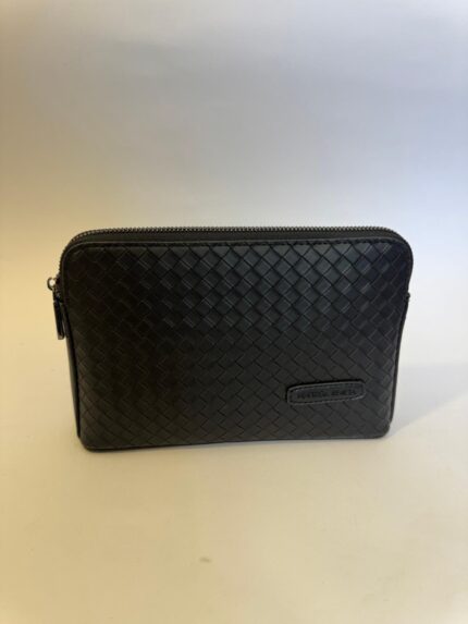 Bottega Veneta black clutch, elegant woven leather design.
