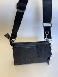 Black Louis Vuitton bag with cardholder and strap.